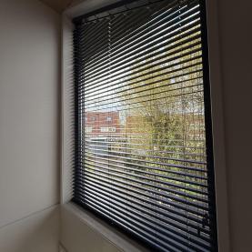 Jaloezieën in trapezium of driehoek 